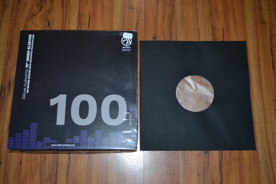 PAPĪRA VĀCIŅI (konverti) 12" iekšējie melni ar caurumu vidū ar oderi (90 gr papīrs ) 100 gab